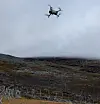 Drone tar av for telling av en reinflokk.